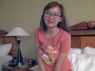 Perky busty asian young female fngers in glasses